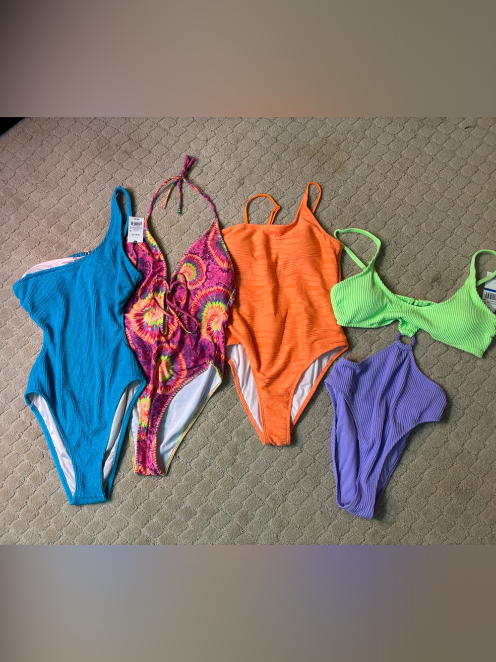 Assorted lot of women’s one piece swimsuits size medium